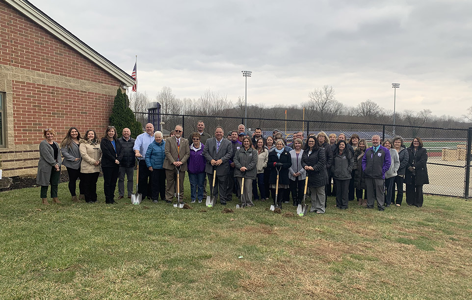 The Athens-Hocking-Vinton Alcohol, Drug Addiction and Mental Health Services group groundbreaking photo with some people holding shovels