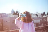 Girl Taking Pictures